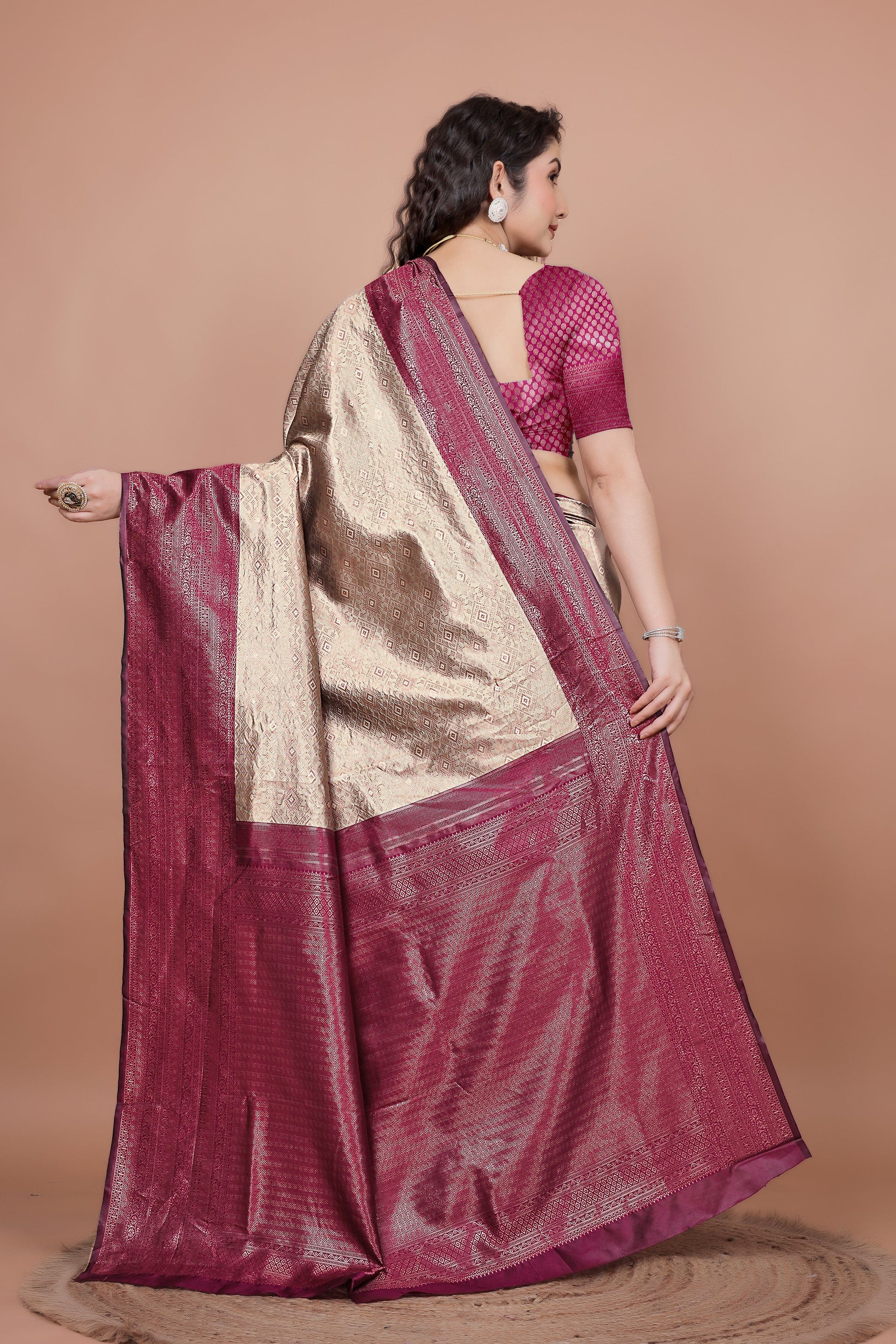 Back view of the saree drape and matching cherry patterned blouse