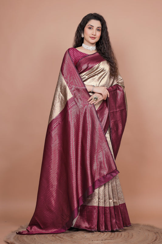 Close up of the heavy zari woven cherry pallu on a traditional silk saree