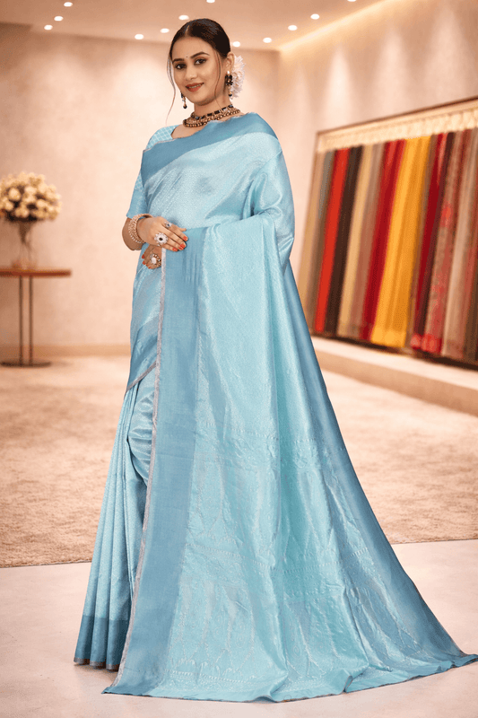 Elegant side drape showcasing the beautiful woven pallu and subtle sheen of the firozi blue saree