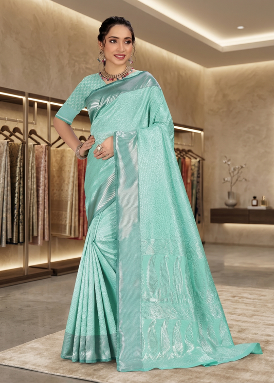 Close up front view of the sea green jacquard saree and matching blouse